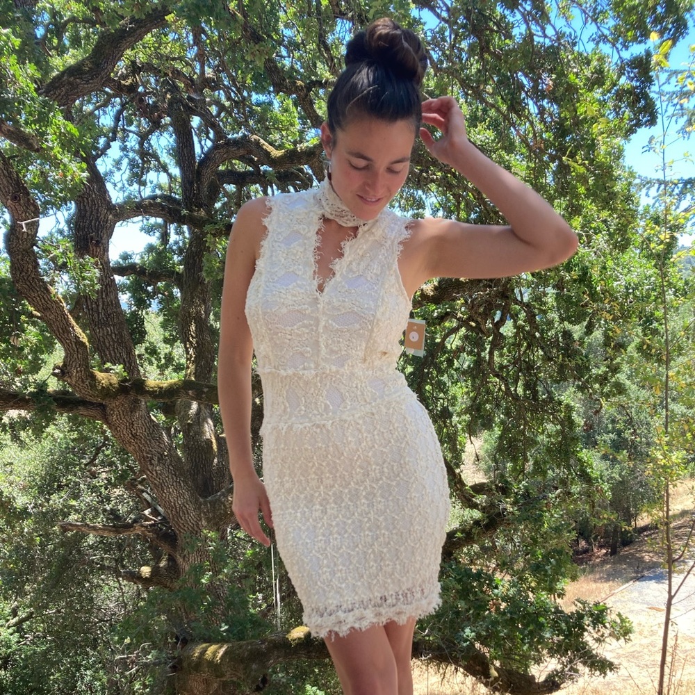 Striking white lace keyhole dress from Nightcap!